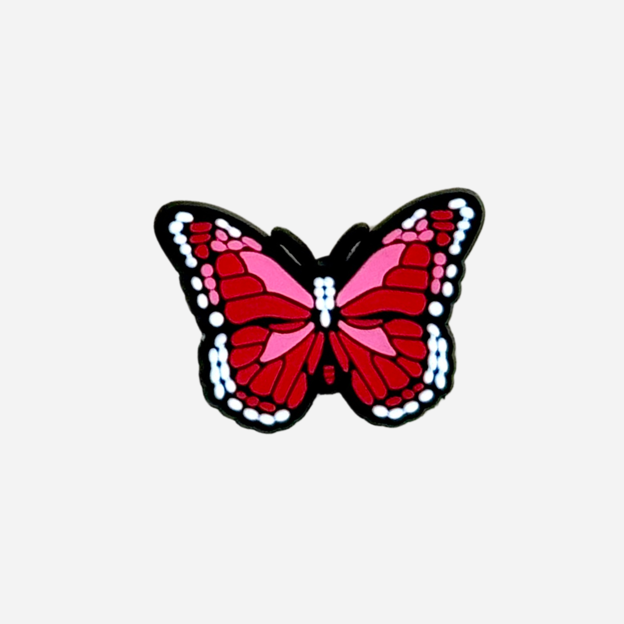 pins papillon rouge